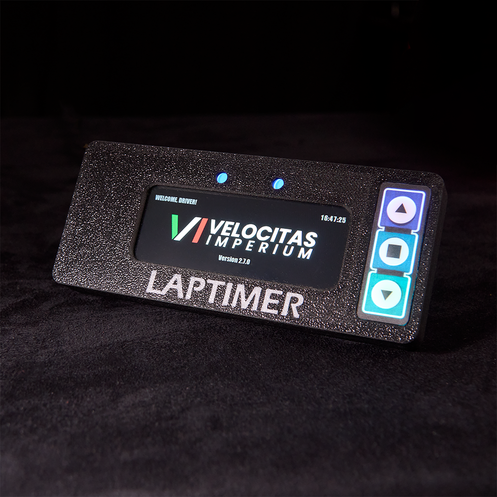 VI-LAPTIMER unit with display and LEDs illuminated, showing the front view.