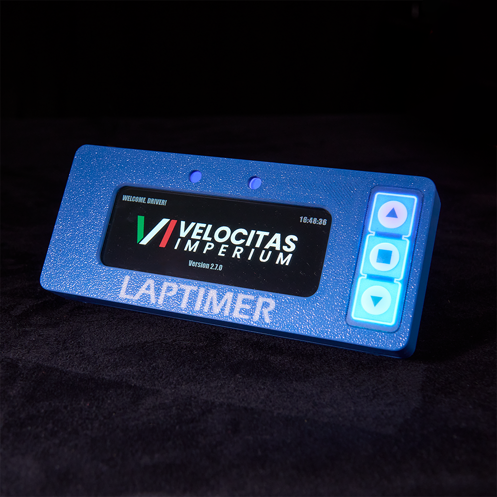 VI-LAPTIMER unit with display and LEDs illuminated, showing the front view.